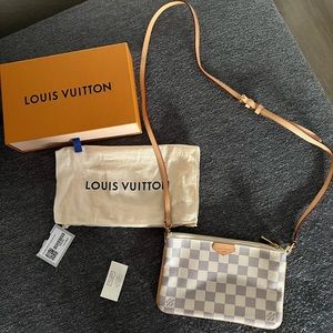 Louis Vuitton double zip pochette in Damier Azure.